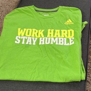 “Work hard stay humble” green men’s adidas tee.